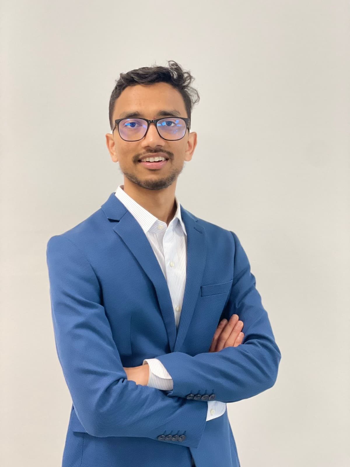Portrait of Tanvir Hasan, VP of Strategy